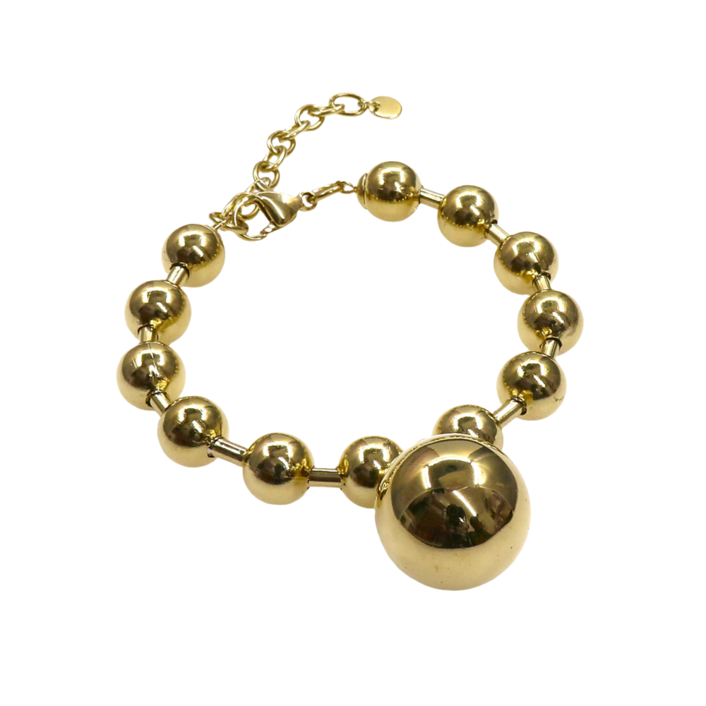 Chunky gold bead bracelet with large central charm and adjustable clasp