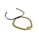 Gold and silver slider bead bracelet with pave Hamsa charm and adjustable black cord