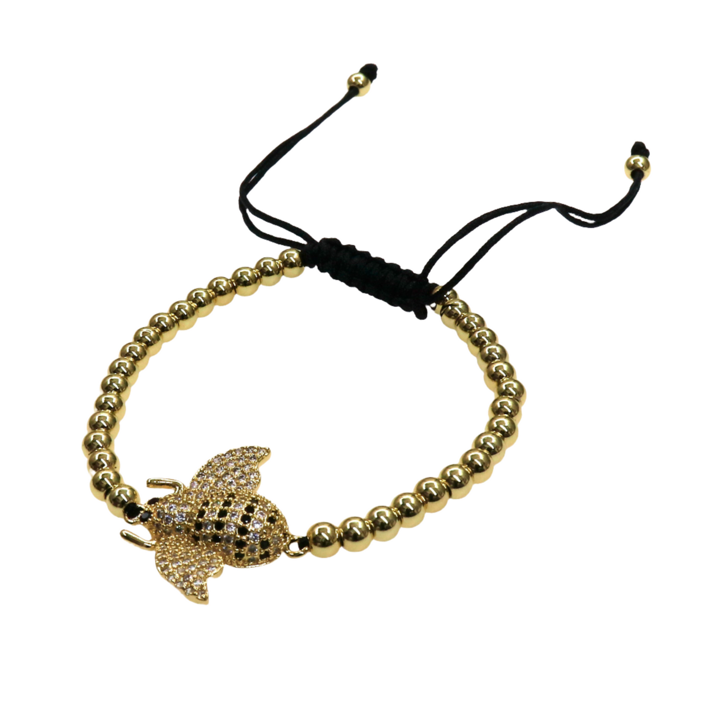 Gold beaded bracelet with detailed bee charm and adjustable black cord slider