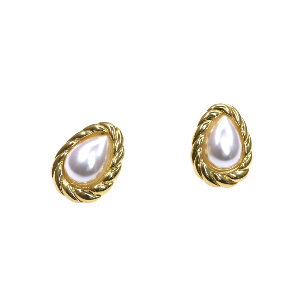 Elegant drop pearl earrings with gold twisted frame design