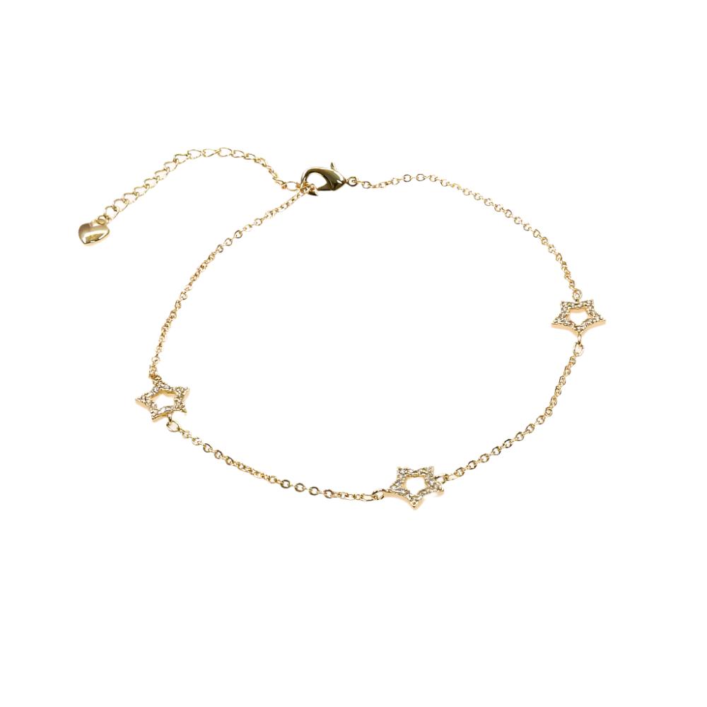 Delicate gold star anklet bracelet with three small star charms and adjustable chain clasp