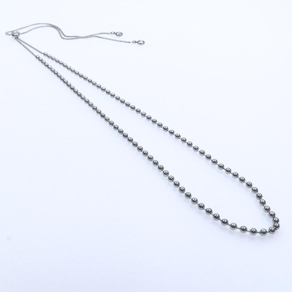 Silver tiny bead chain necklace with adjustable clasp for elegant fit and versatile style