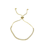 Elegant gold tinny tennis slider bracelet with sparkling stones and adjustable chain