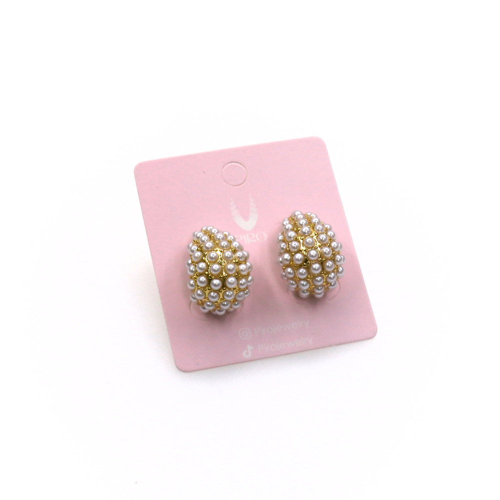 Elegant Pearls Gota earrings with mini pearls on a pink display card