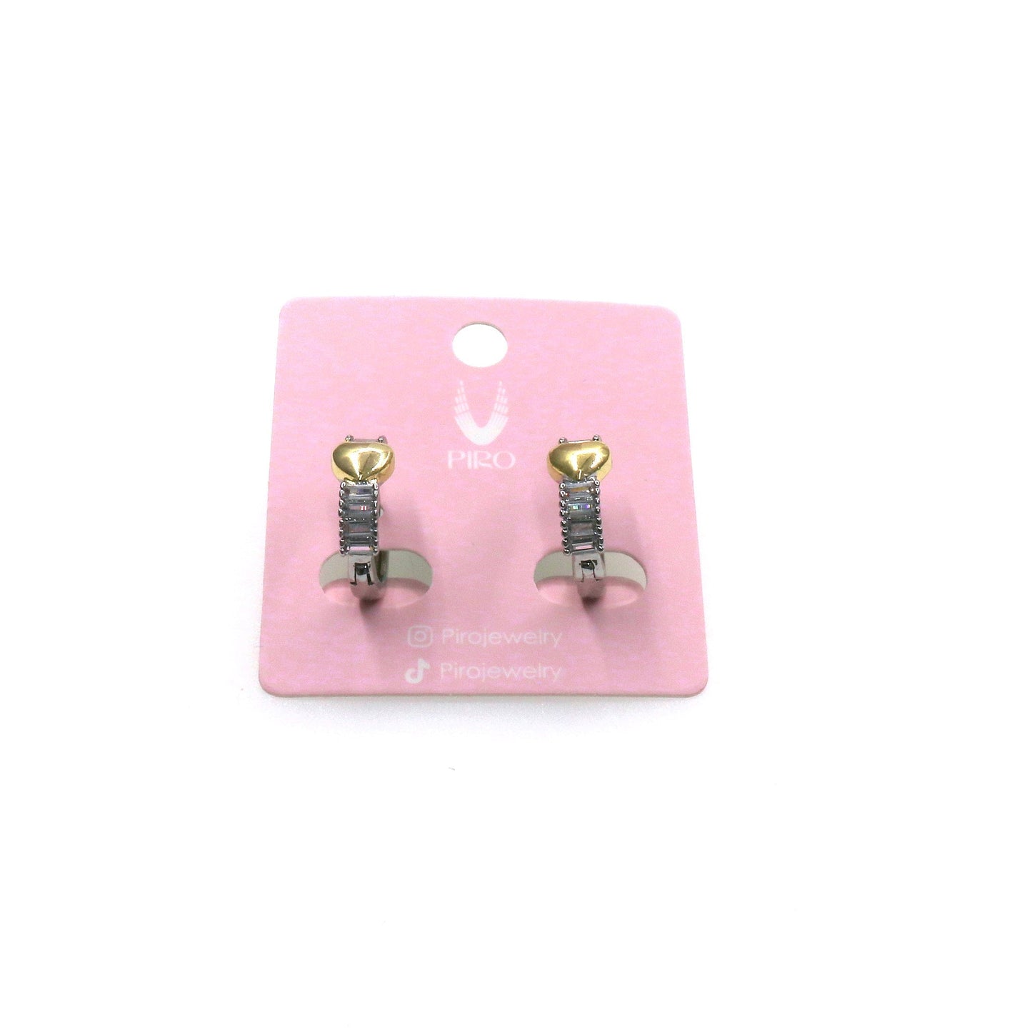 Baguette Huggie earrings with heart detail on pink display card