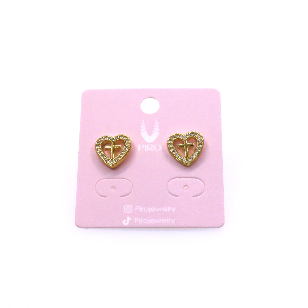 Gold heart-shaped CROSS LOVE STUD earrings with cross design on pink display card