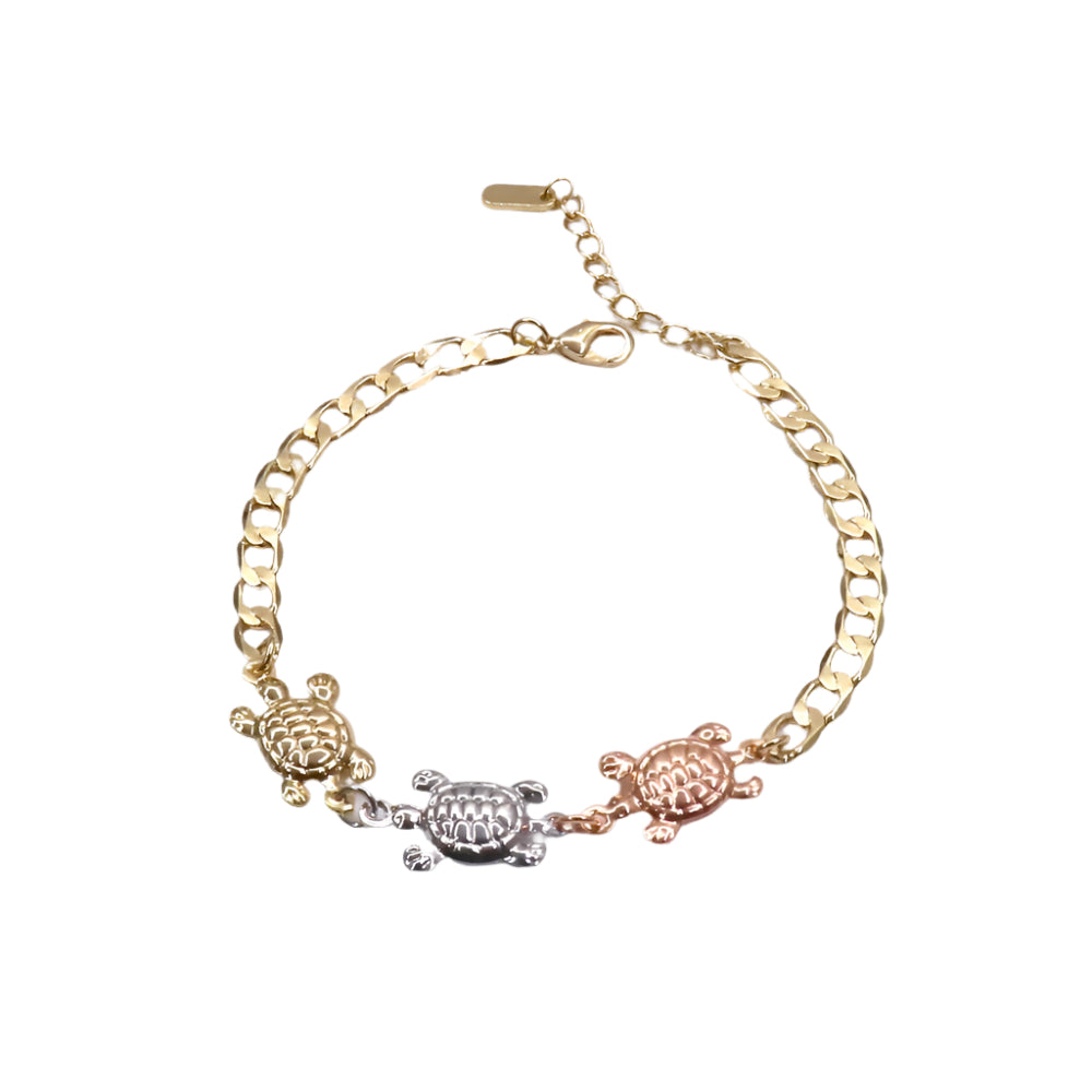 Gold-filled Tortuga 3 Color bracelet with three turtle charms in gold, silver, and rose gold tones