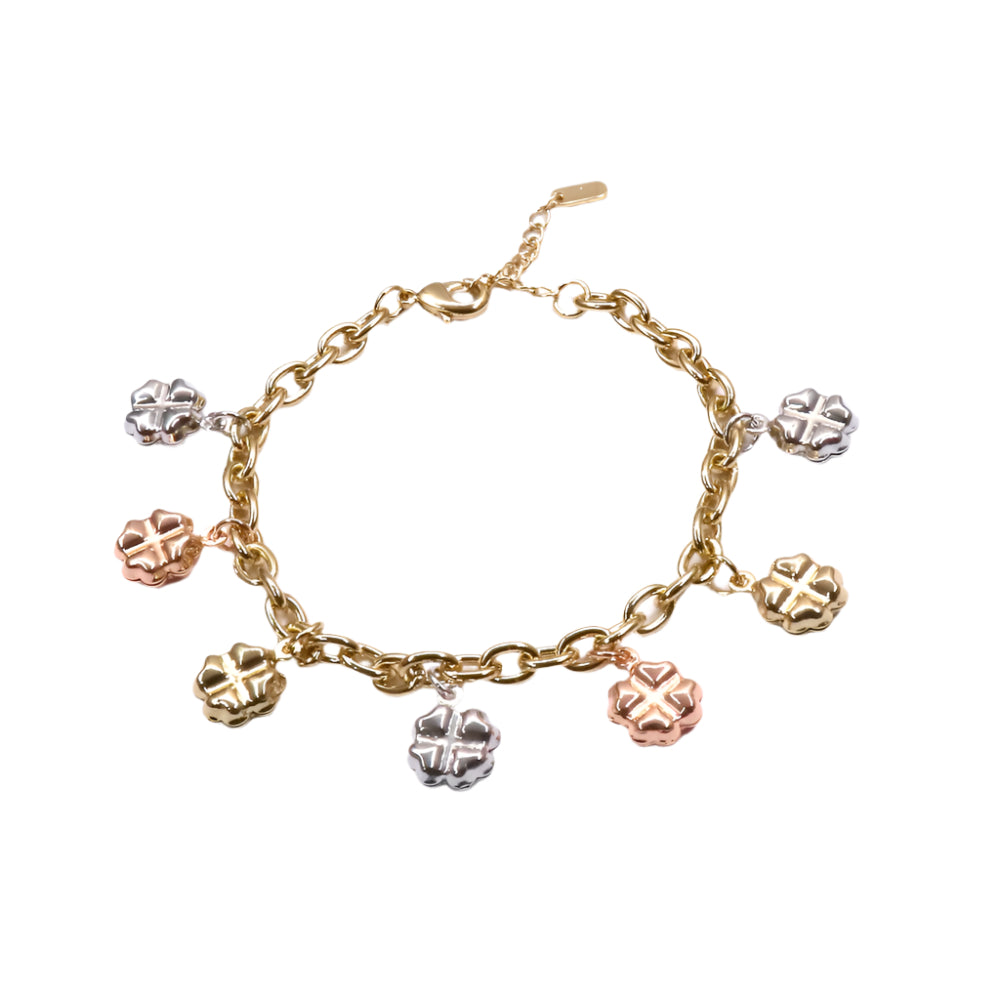 Gold filled bracelet with three-color trebol charms in yellow, rose, and white gold tones.