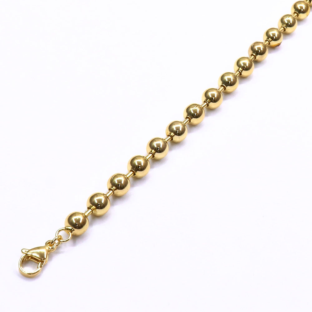 BEADS GOLD BRACELET with lobster clasp on white background