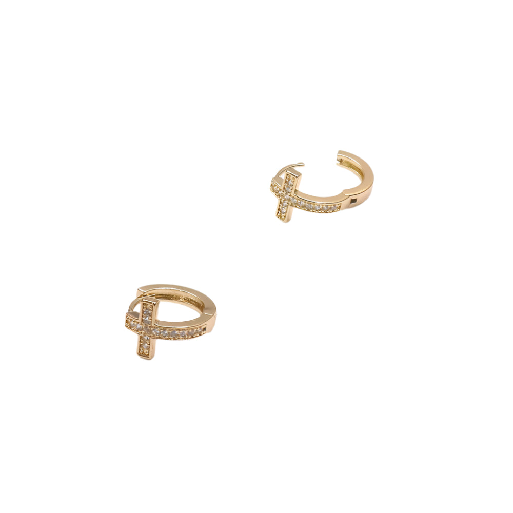 Gold huggie earrings with zirconia cross embellishments