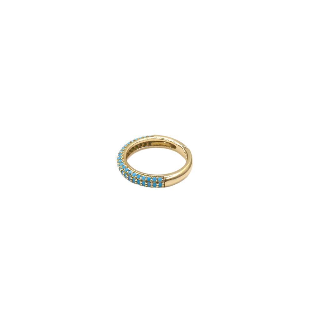 SINGLE TURQUESA RING ring featuring a single row of small turquoise stones, elegant and handcrafted design.