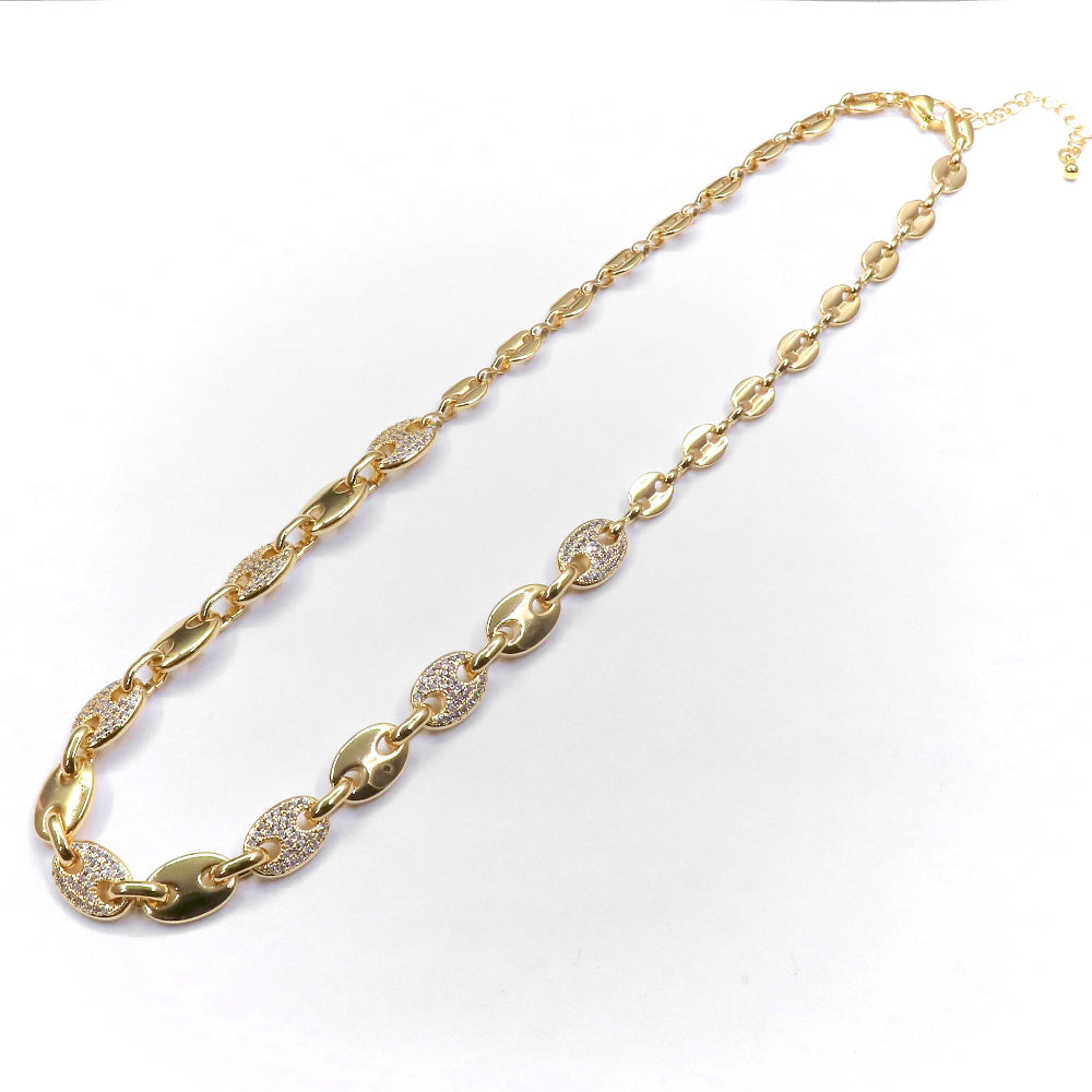 Gold-filled SHINE GG necklace and bracelet set with zirconia stone accents, elegant and durable jewelry duo.