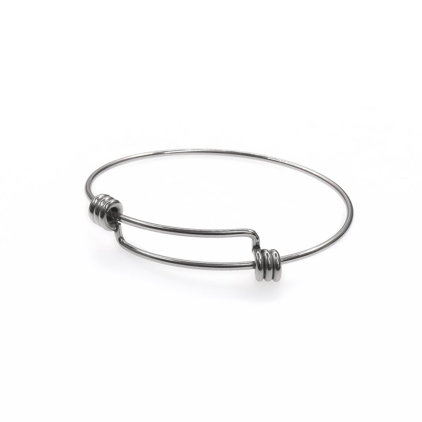 Silver base bracelet for adding and customizing charms with a secure, adjustable design