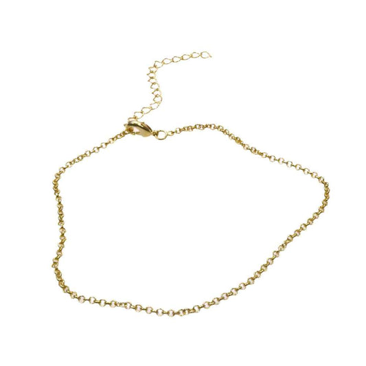 Gold rolo anklet bracelet with distinctive chain design.