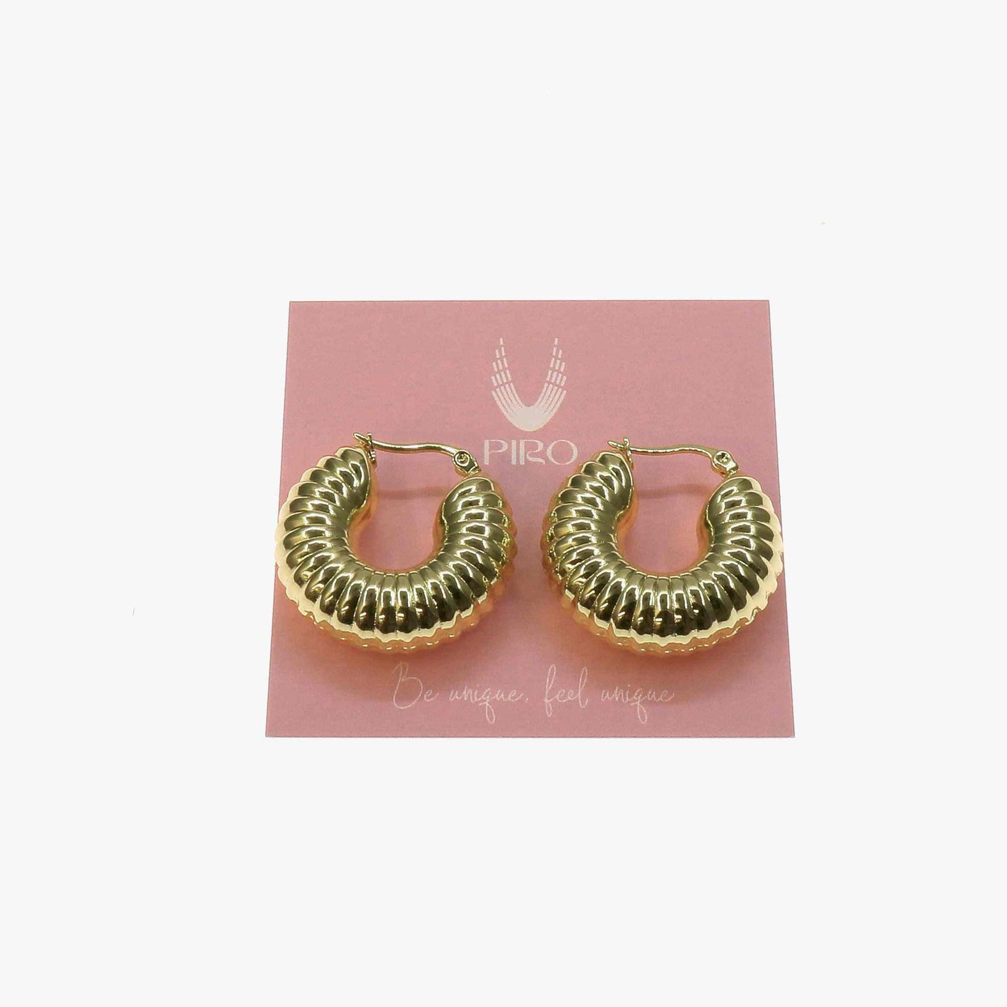 Chunky gold filled Africa Hoop earrings on a pink branded card