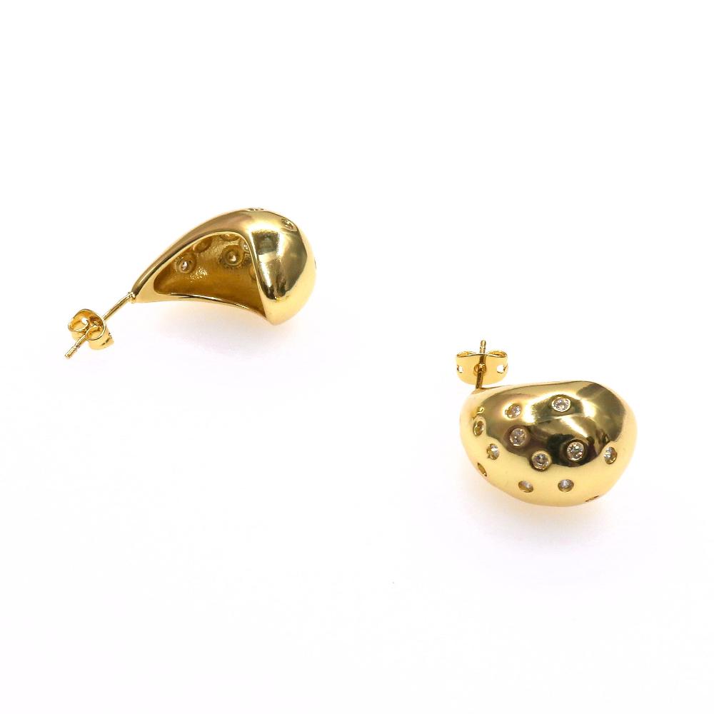 Pair of elegant gold tonoes Gota earrings with sparkling zirconia stones studded design