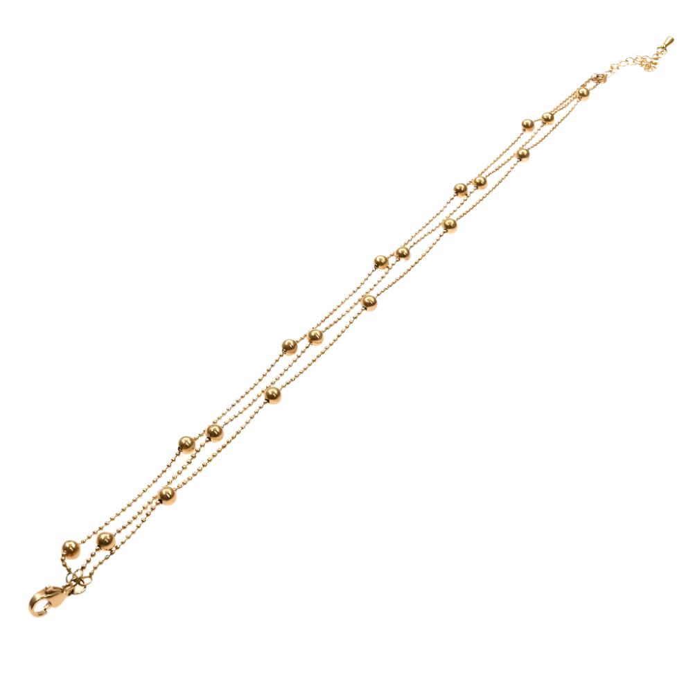 Gold layered anklet bracelet with small round bead accents and lobster clasp closure