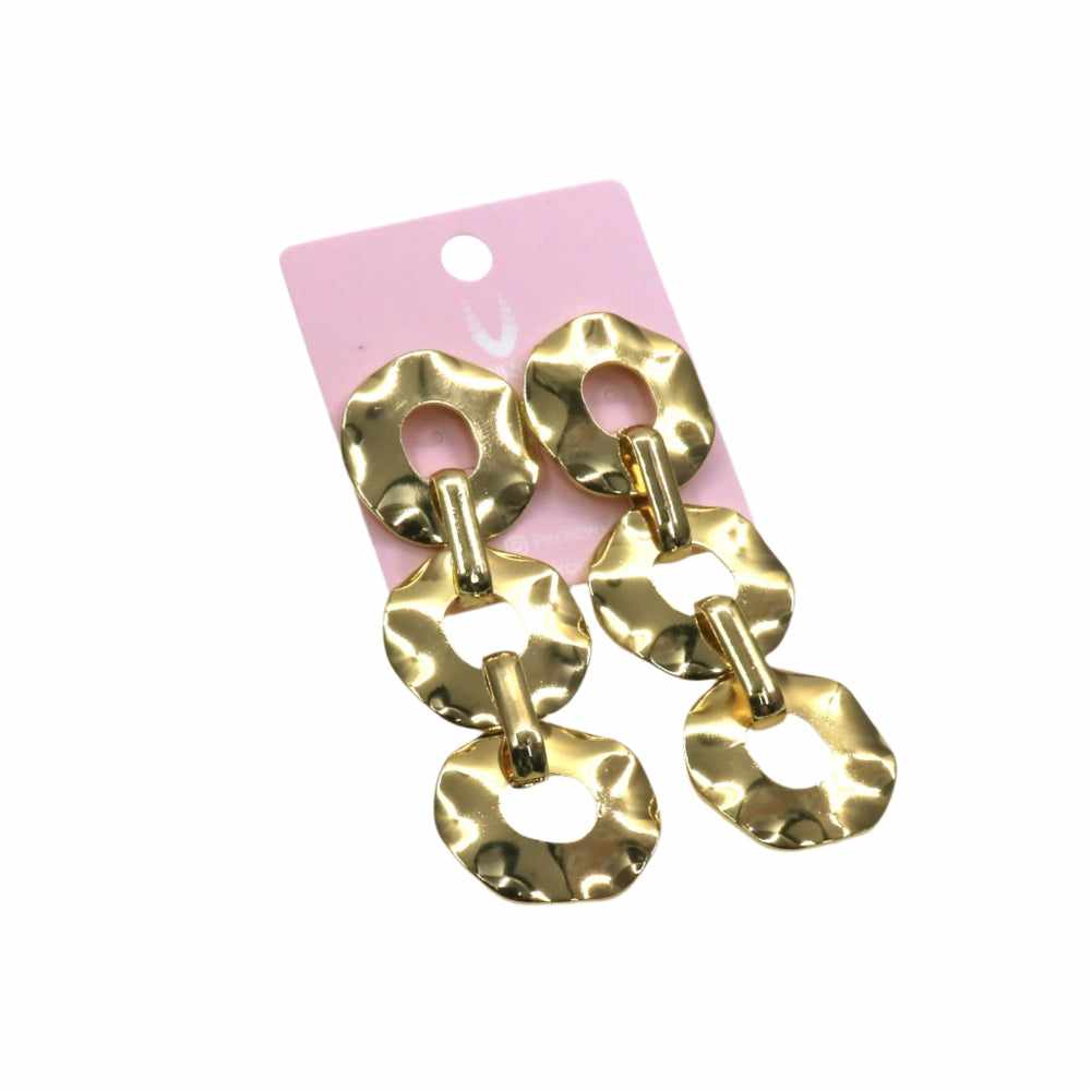 Long circles earrings with gold-tone sleek design hanging on a display card.