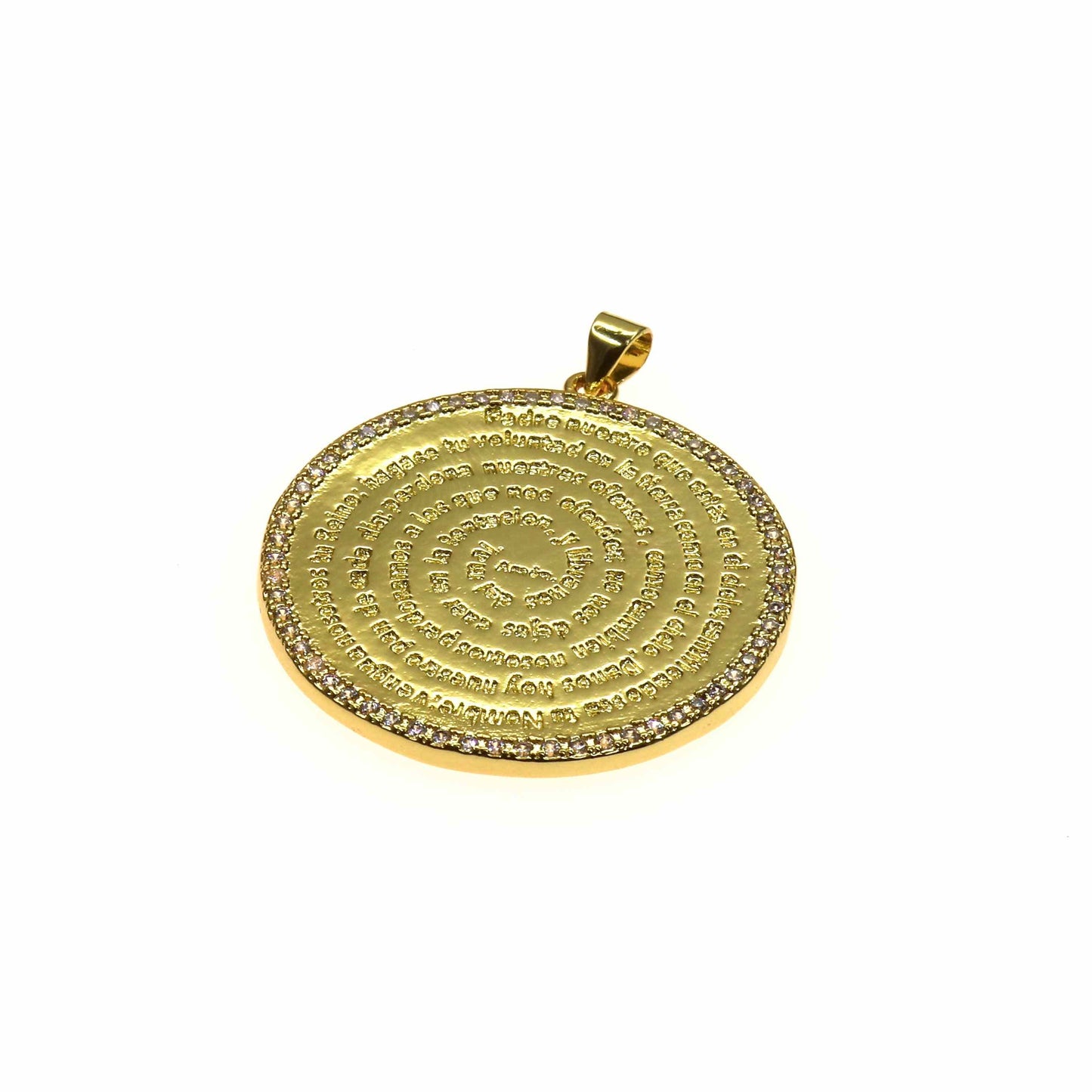Gold medallion engraved with the Padre Nuestro prayer in circular text and surrounded by small stones