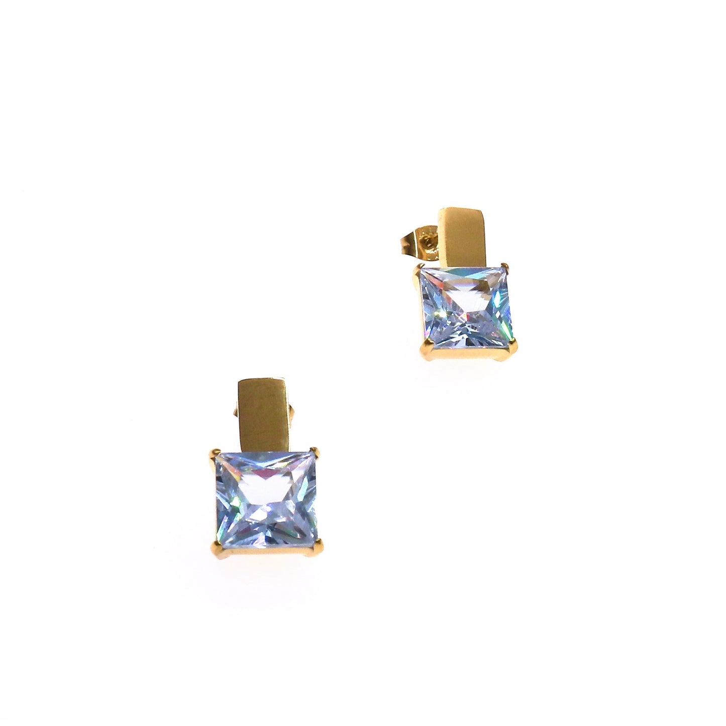 Gold earrings with large square zirconia stones, elegant and glamorous design