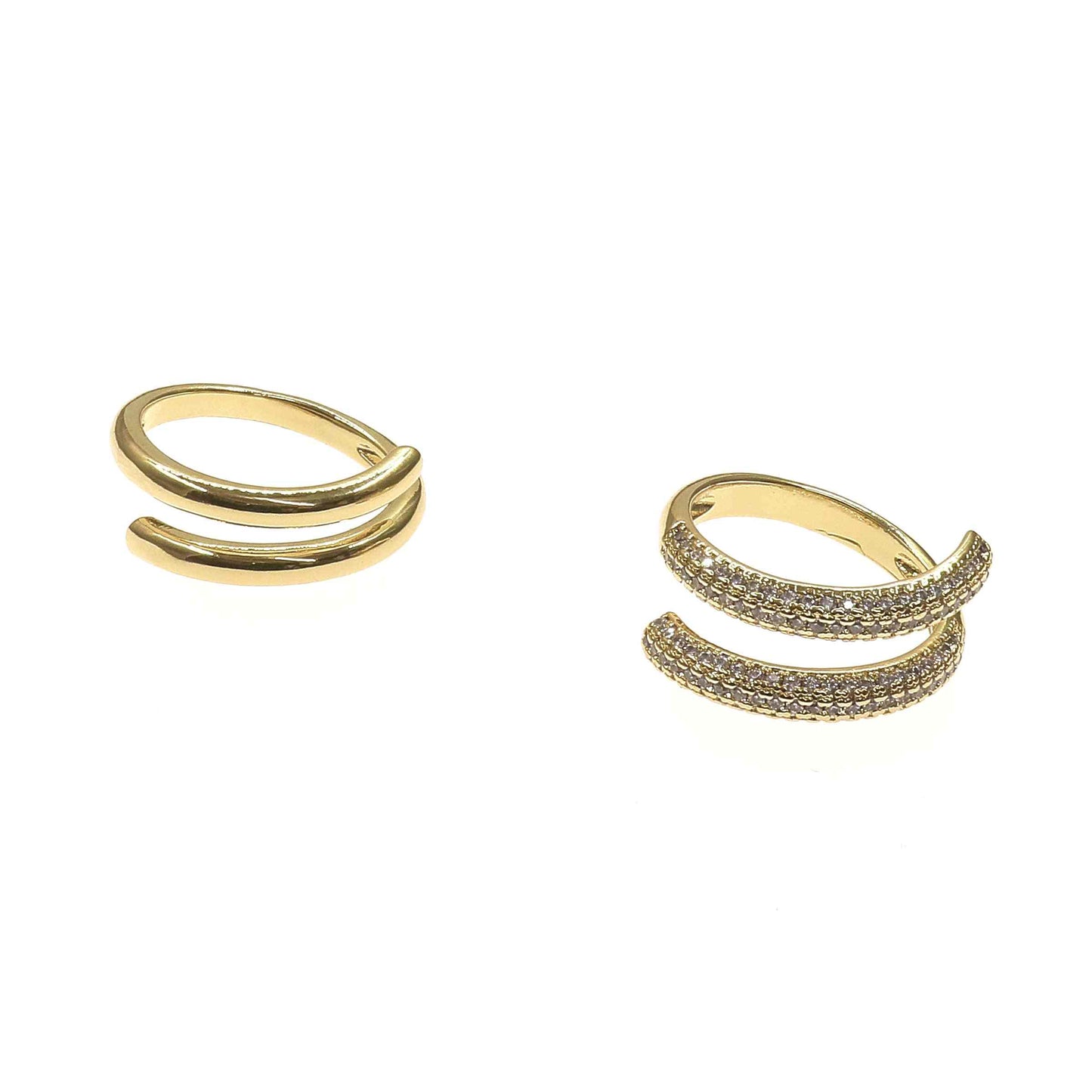 Set of two gold rings with one featuring sparkling pave crystals and the other a sleek adjustable design
