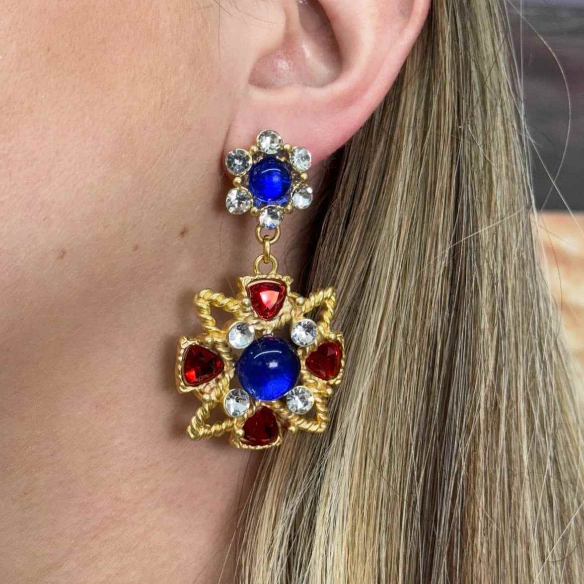 INFANTA EARRING in gold filled material with vintage-inspired design featuring blue and red gemstones.