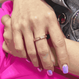 SHINE SCREW GOLD RING with polished finish and screw detailing on hand.