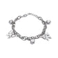 Rhodium plated charms bracelet with various geometric and textured charms on a chain link design.