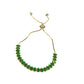 Gold slider bracelet with green zirconia stones and adjustable chain clasp