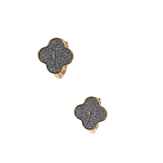 Pair of gold and gray quatrefoil earrings on a white background