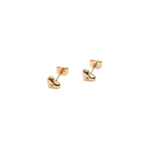 Gold heart-shaped stud earrings on a white background