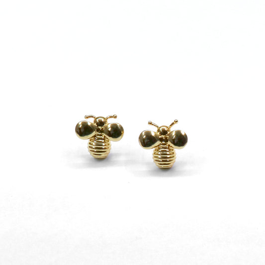 Gold bee-shaped earrings on a white background