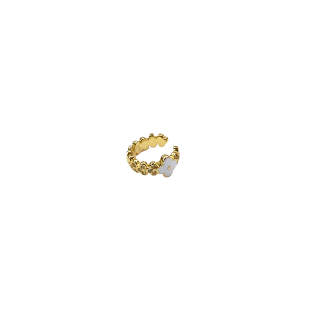 Gold ring with a small white stone on a white background