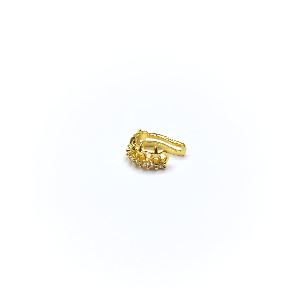 Gold ring with small diamonds on a white background
