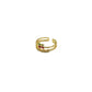 Gold ring with red stones on a white background