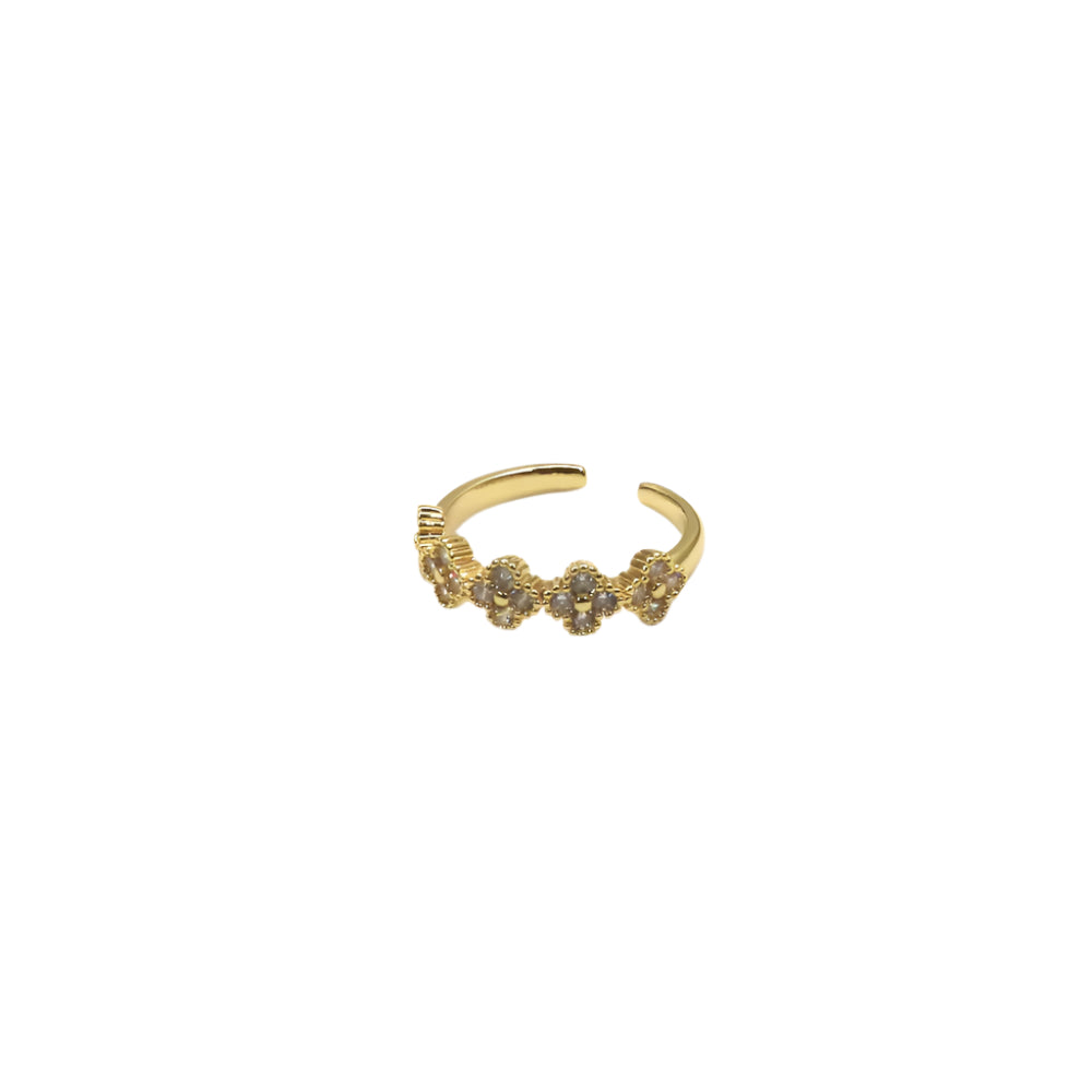 Gold ring with small stones on a white background
