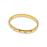 GOLD BANGLE WITH  SCATTERED ZIRCONIA