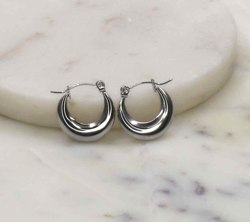 Modern flat earrings made from premium stainless steel, showcasing sleek and contemporary design.