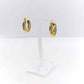 Gold oval earrings on display stand, crafted from high-grade stainless steel.