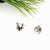 Pearl earrings with stainless steel accents in a modern design.