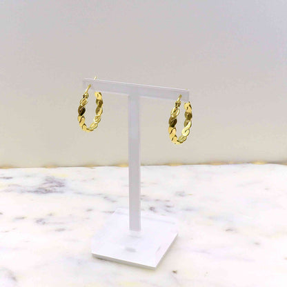 Gold rope earrings on display stand, made from high-quality stainless steel.
