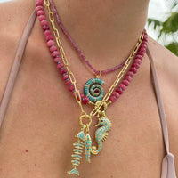 Gold Painted Conch Shell Pendant with Cubic Zirconia