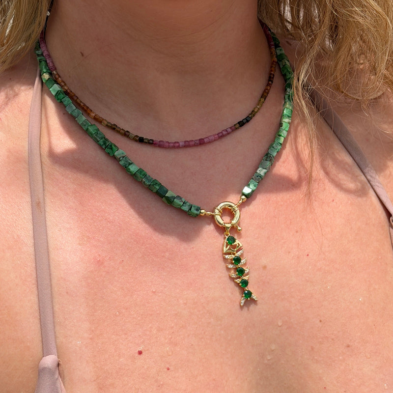 Gold Fish Pendant with Green Crystal Details