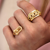 GOLD SCULPTURAL LINK RING WITH PAVE ZIRCON ACCENTS