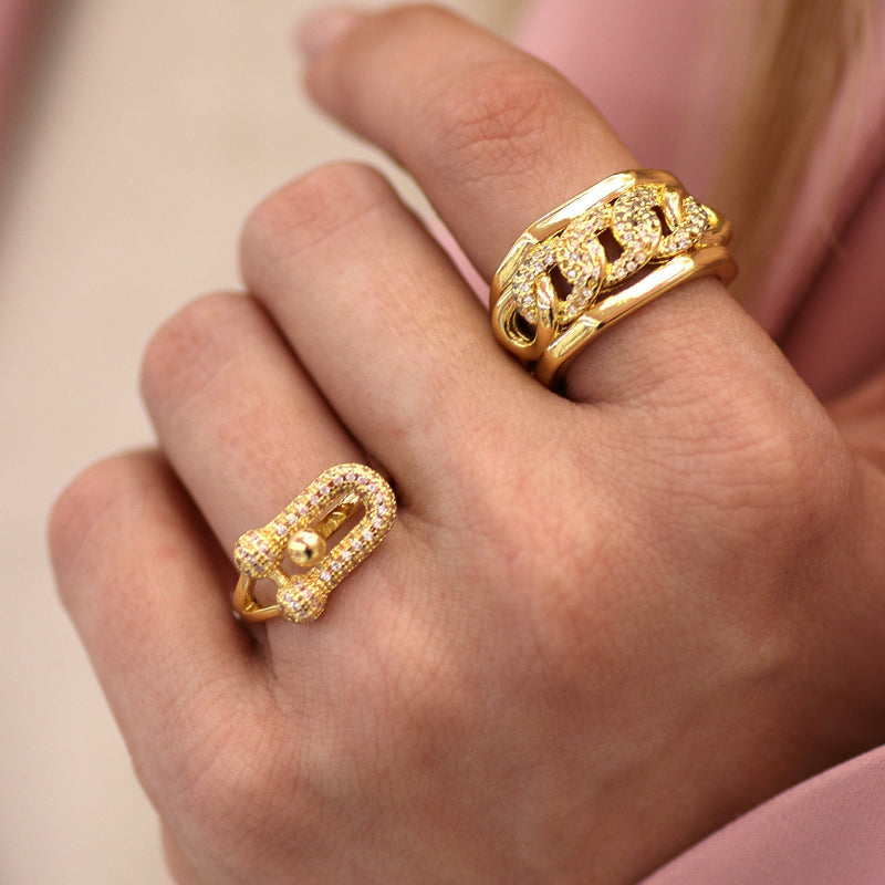 GOLD SCULPTURAL LINK RING WITH PAVE ZIRCON ACCENTS