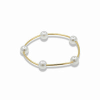 Elastic pearl bracelet with gold bar details  Description
