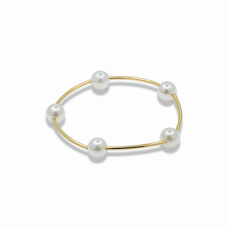 Elastic pearl bracelet with gold bar details  Description