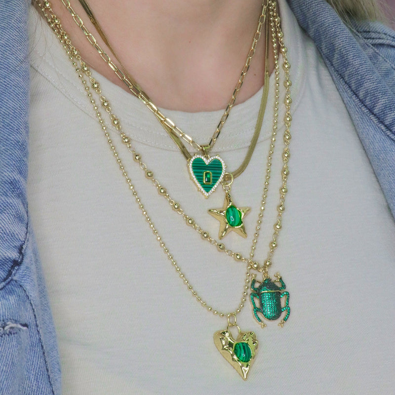 14k Gold Plated Mother Of Pearl Heart Pendant With Gemstone Center