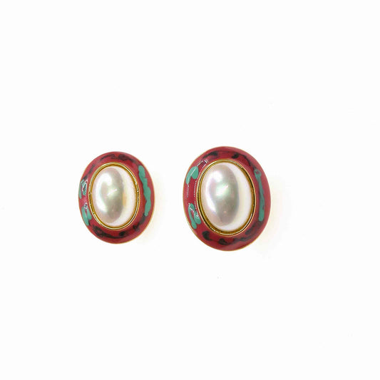 Luxury CONDESA EARRING with intricate design, pearl center, and elegant craftsmanship.