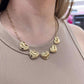 Stainless steel love chain with solid heart charms in gold and silver.